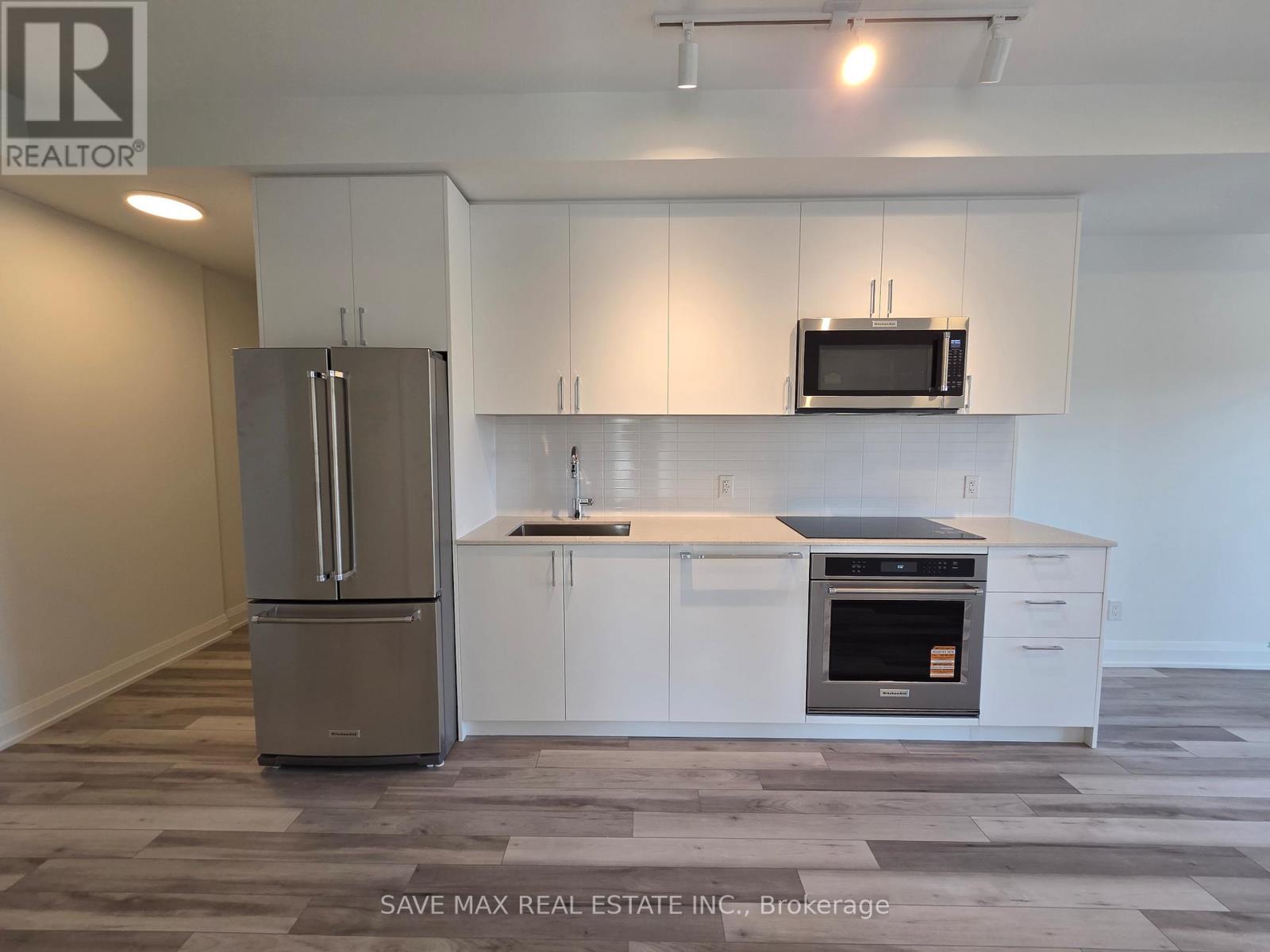 211 - 3250 Carding Mill Trail, Oakville, Ontario  L6M 1L3 - Photo 6 - W12565392