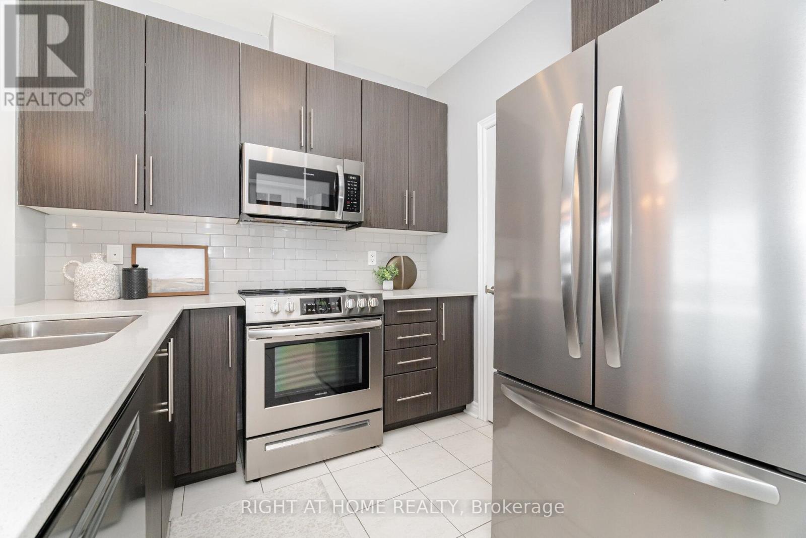 408 - 33 Whitmer Street, Milton, Ontario  L9T 8P9 - Photo 9 - W12565420