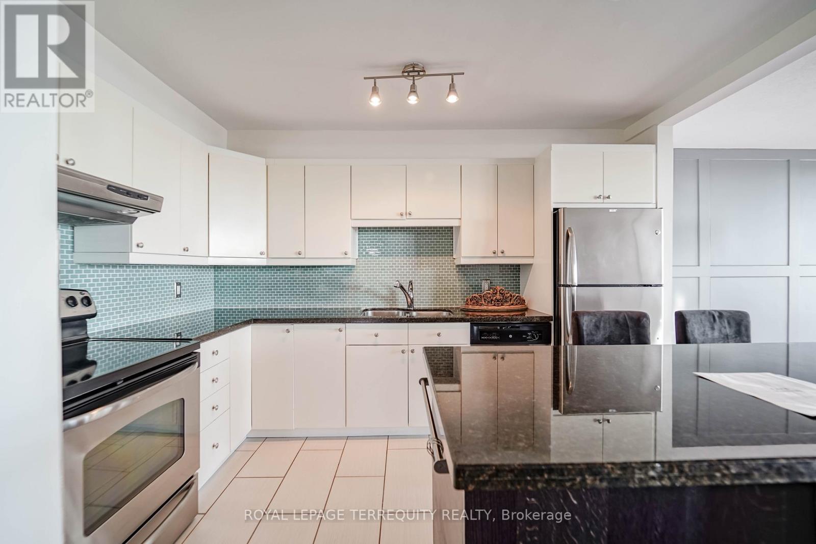 1002 - 14 Neilson Drive, Toronto, Ontario  M9C 1V6 - Photo 13 - W12565550