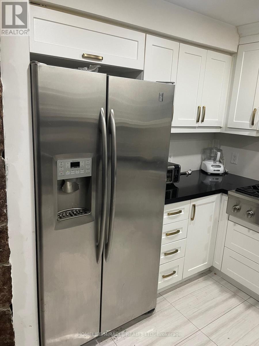 1-847 Runnymede Road, Toronto, Ontario  M6N 3W1 - Photo 3 - W12566112