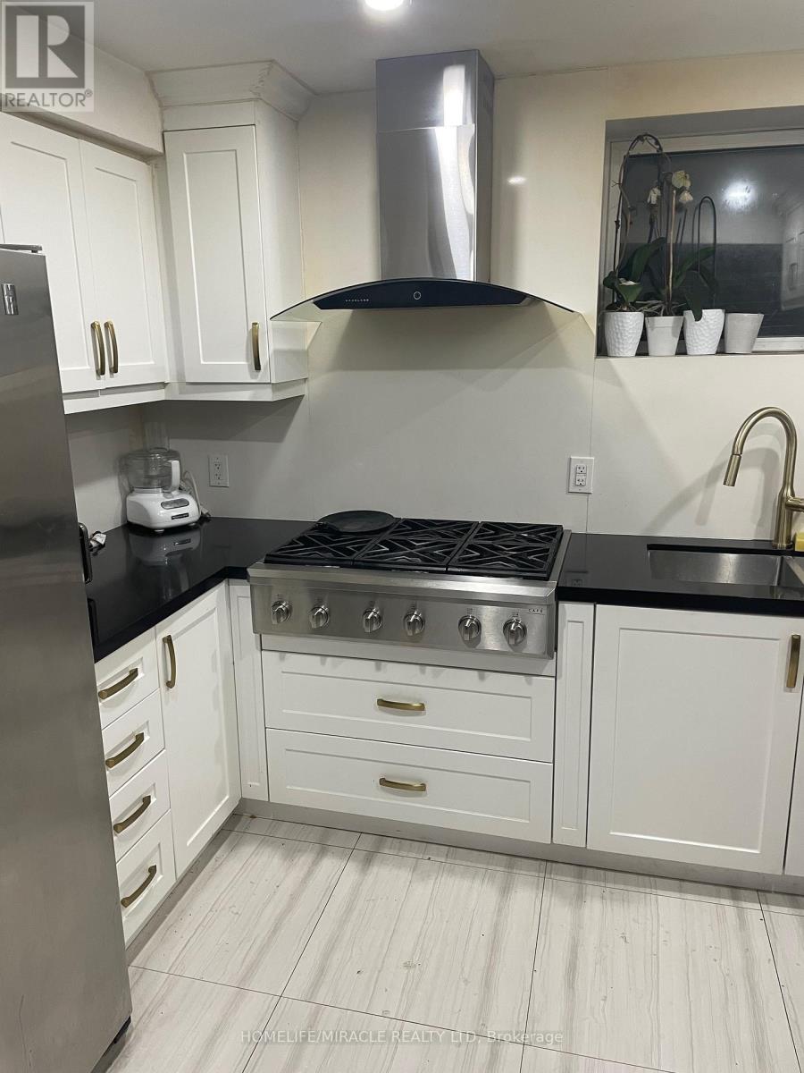 1-847 Runnymede Road, Toronto, Ontario  M6N 3W1 - Photo 4 - W12566112