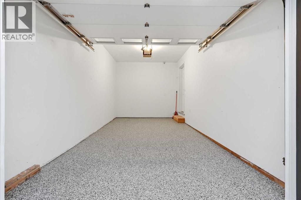 71 Panatella Hill Nw, Calgary, Alberta  T3K 0S7 - Photo 7 - A2234588