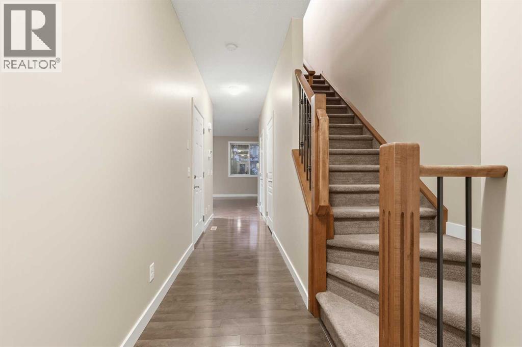 71 Panatella Hill Nw, Calgary, Alberta  T3K 0S7 - Photo 6 - A2234588