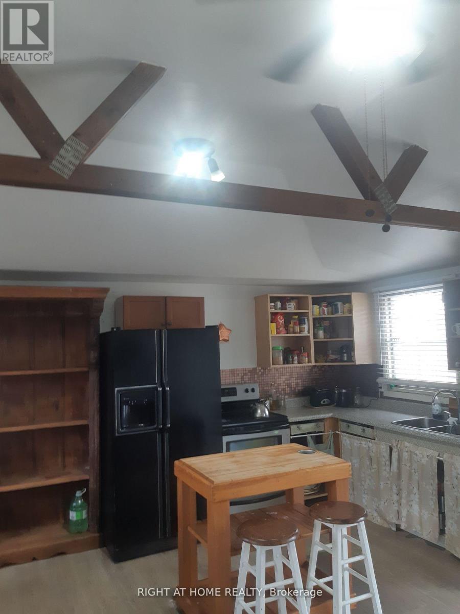 208 Mcguire Beach Road, Kawartha Lakes, Ontario  K0M 2B0 - Photo 5 - X12566298