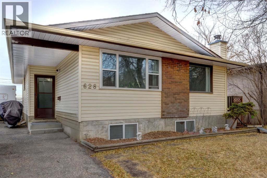 628 Cantrell Drive Sw, Calgary, Alberta  T2W 1W7 - Photo 1 - A2270061
