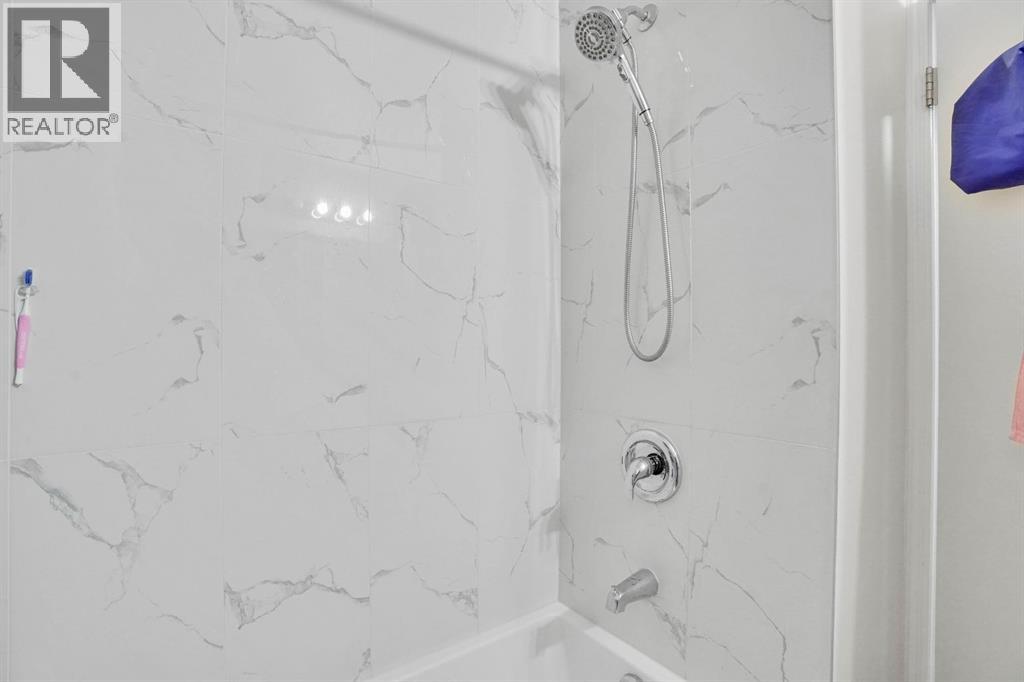 1038 Berkley Drive Nw, Calgary, Alberta  T3K 1A3 - Photo 30 - A2269891