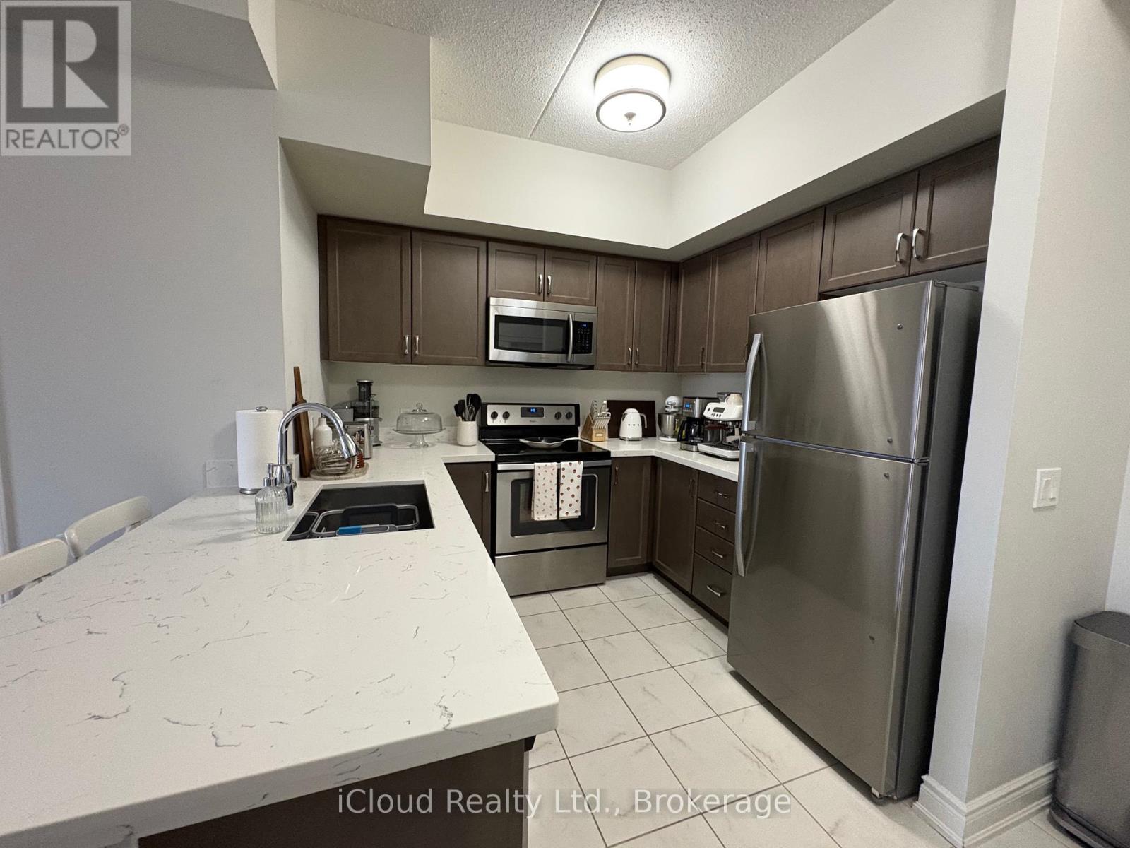 218 - 640 Sauve Street, Milton, Ontario  L9T 9A7 - Photo 4 - W12529026