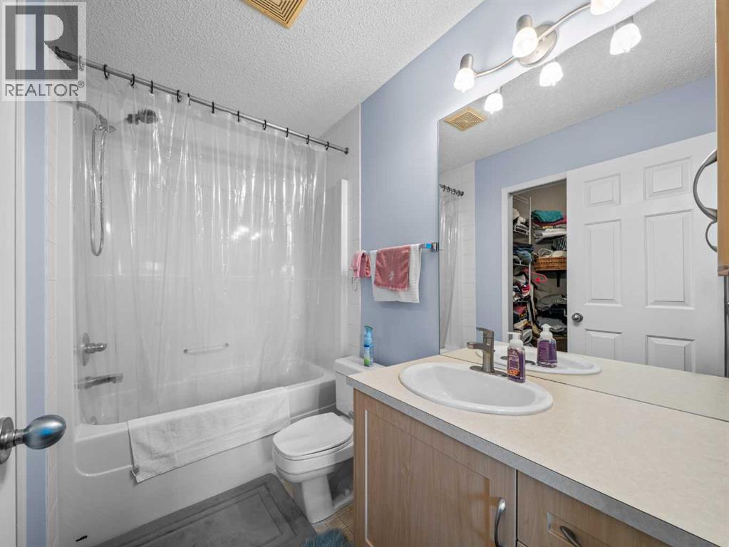 104 Rocky Ridge Heath Nw, Calgary, Alberta  T3G 4Z8 - Photo 16 - A2261861