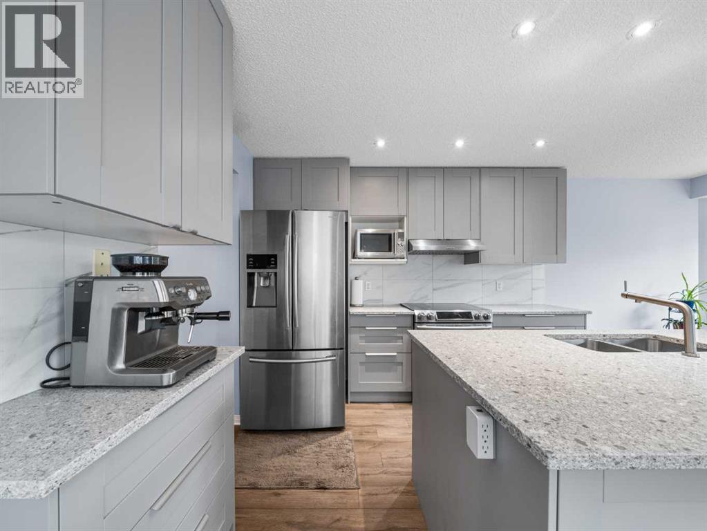 104 Rocky Ridge Heath Nw, Calgary, Alberta  T3G 4Z8 - Photo 7 - A2261861