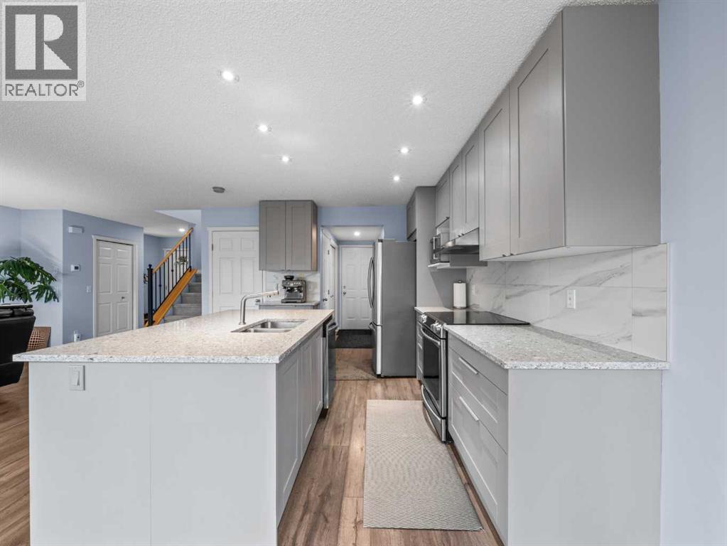 104 Rocky Ridge Heath Nw, Calgary, Alberta  T3G 4Z8 - Photo 9 - A2261861