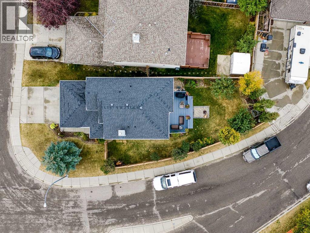 104 Rocky Ridge Heath Nw, Calgary, Alberta  T3G 4Z8 - Photo 30 - A2261861