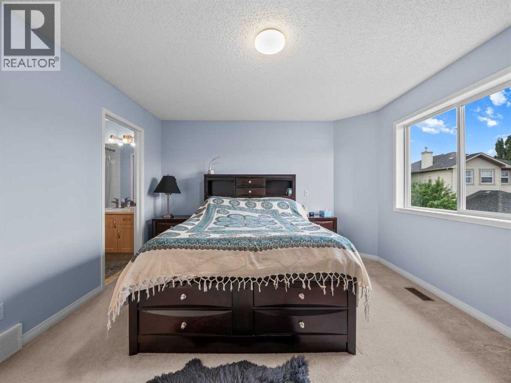 104 Rocky Ridge Heath Nw, Calgary, Alberta  T3G 4Z8 - Photo 15 - A2261861