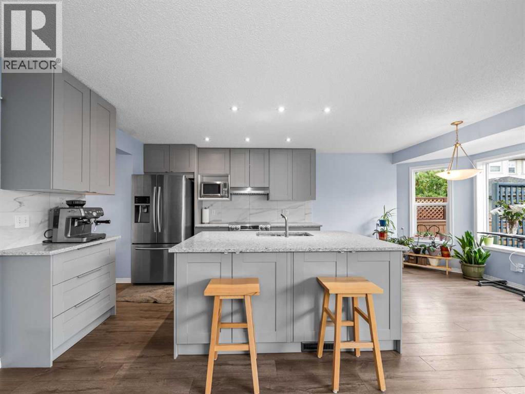 104 Rocky Ridge Heath Nw, Calgary, Alberta  T3G 4Z8 - Photo 6 - A2261861