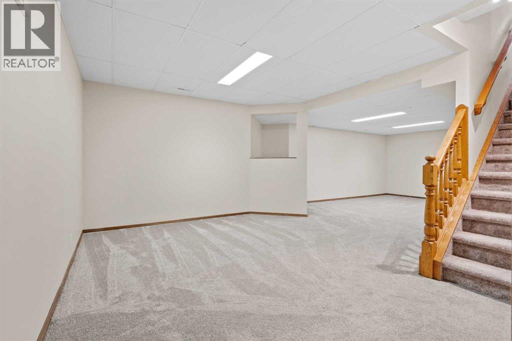 667 Macewan Drive Nw, Calgary, Alberta  T3K 3R3 - Photo 25 - A2267646