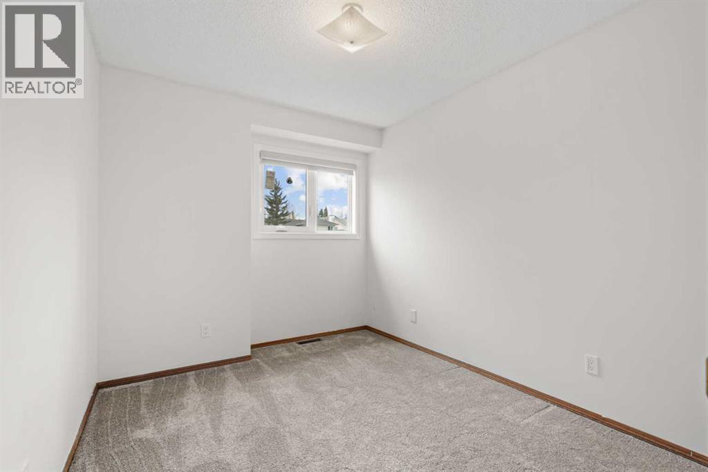 667 Macewan Drive Nw, Calgary, Alberta  T3K 3R3 - Photo 19 - A2267646