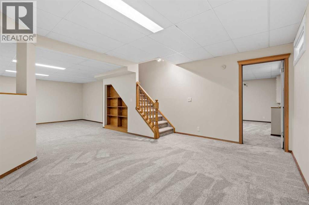 667 Macewan Drive Nw, Calgary, Alberta  T3K 3R3 - Photo 24 - A2267646