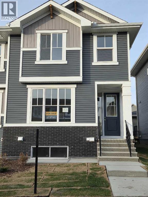 63 Lambeau Lane Se, Airdrie, Alberta  T4A 3P3 - Photo 1 - A2252055