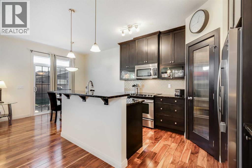 1318 Ravenswood Drive Se, Airdrie, Alberta  T4A 0P8 - Photo 4 - A2253415