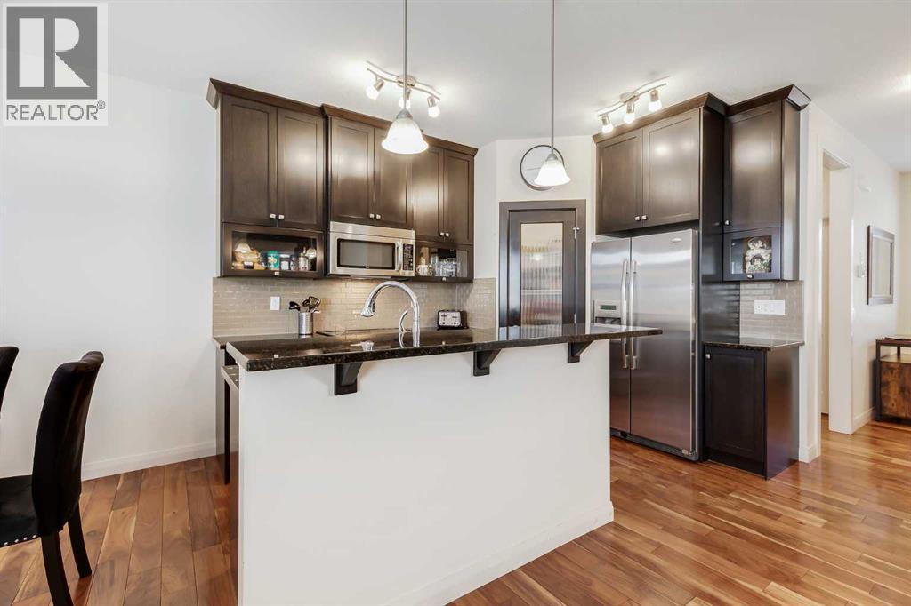 1318 Ravenswood Drive Se, Airdrie, Alberta  T4A 0P8 - Photo 5 - A2253415