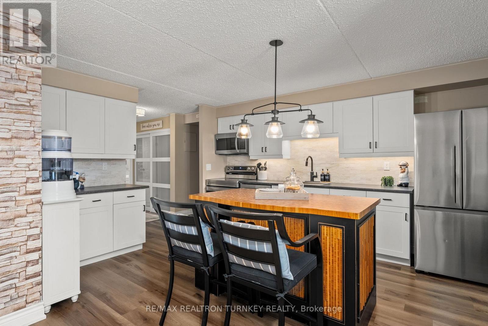 102 - 74 The Queensway S, Georgina, Ontario  L4P 1Z3 - Photo 4 - N12567084