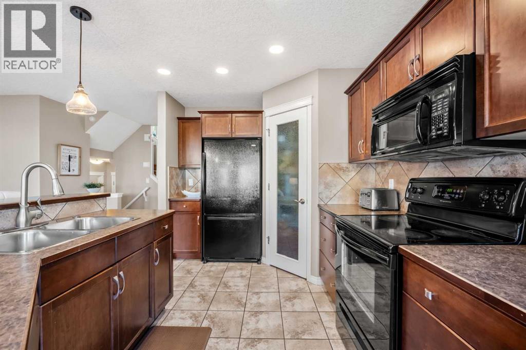 209 New Brighton Lane Se, Calgary, Alberta  T2Z 0E1 - Photo 10 - A2269315