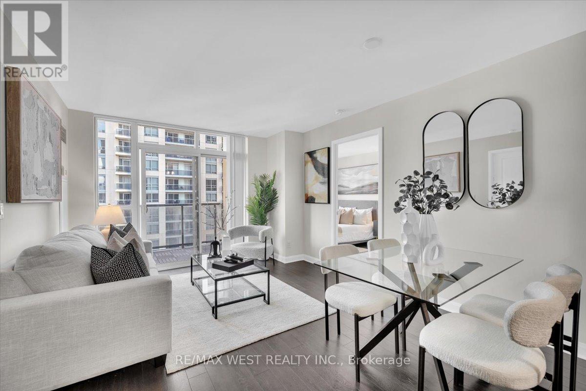 First time on the market! This is one of the best 2 bedroom, 2 bathroom layouts in Vivid Condos, offering a true split floor plan with 2 full bathrooms. Premium parking on P1 and an oversized locker on P1, so no long ramp drives! Located in the highly sought after Michael Power Place, where style meets convenience. Only a 5 minute walk to Islington Subway and minutes to Kipling GO, Hwy 427, and the QEW. The open concept living, dining, and kitchen area features stainless steel appliances, a large free standing centre island with a quartz waterfall countertop, and crisp white shaker style cabinetry with upper glass inserts. The mosaic backsplash complements the stainless steel appliances and the laminate flooring adds a warm, modern feel throughout the space. Both bedrooms are generous in size and include closets with built in inserts for excellent storage. The primary bedroom also features its own private ensuite. A nice size balcony with decking tiles is perfect for morning coffee or evening tea. Vivid Condos at 1 Michael Power Place offers a full range of amenities including 24 hour concierge and security, ample visitor parking, an indoor pool, a fully equipped gym with change rooms, a theatre and media room, billiards lounge, library, and multipurpose rooms for meetings or social gatherings. Designed for comfort and convenience, the building provides quiet spaces to unwind and social areas to enjoy, creating a community focused lifestyle in the heart of Etobicoke. (id:48254)