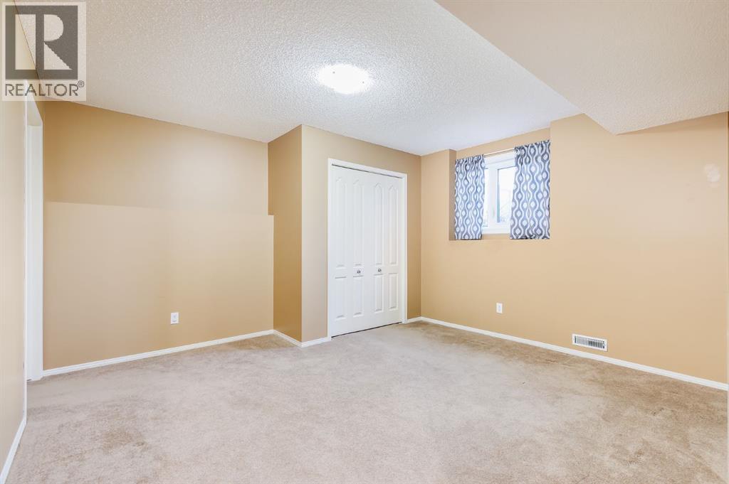 1808 Meadowbrook Gate Se, Airdrie, Alberta  T4A 2B4 - Photo 31 - A2269704