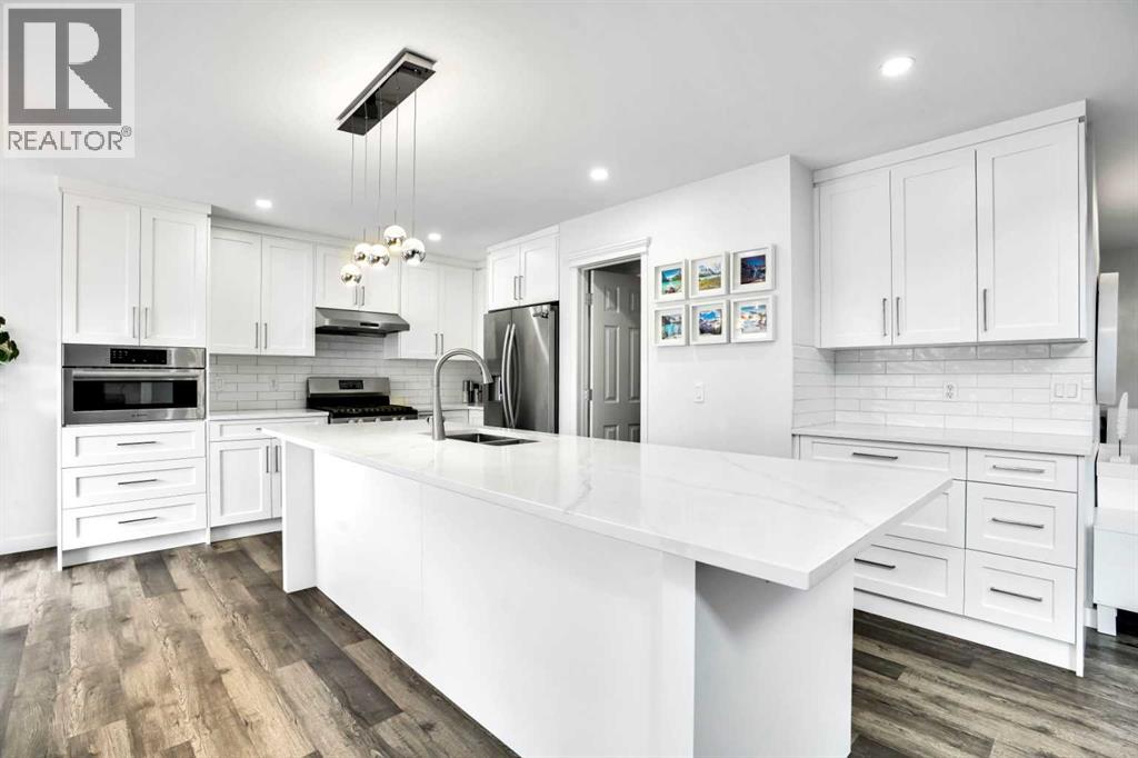 73 Elkton Way Sw, Calgary, Alberta  T3H 4Y9 - Photo 6 - A2263378