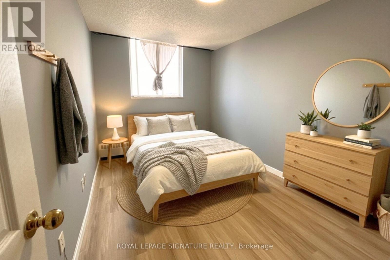 1211 - 200 Lotherton Pathway, Toronto, Ontario  M6B 2G9 - Photo 6 - W12567402