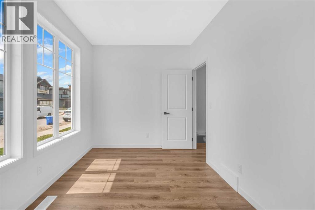 32 Rowmont Common Nw, Calgary, Alberta  T3L 0L3 - Photo 7 - A2233479