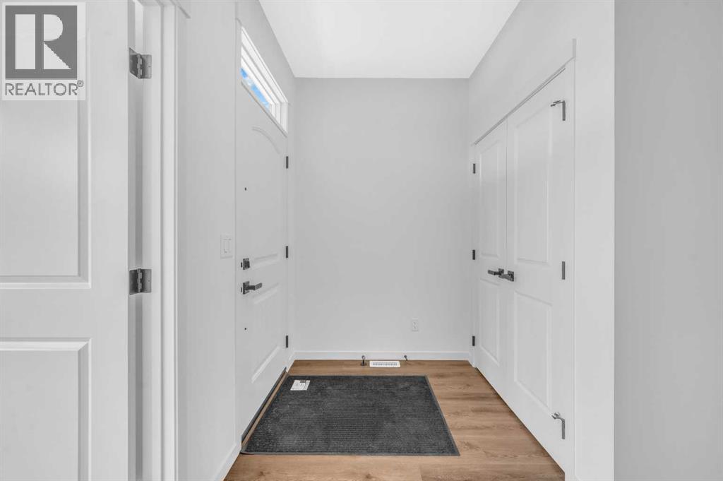 32 Rowmont Common Nw, Calgary, Alberta  T3L 0L3 - Photo 5 - A2233479