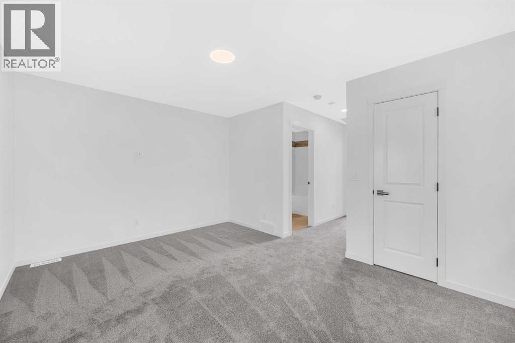 32 Rowmont Common Nw, Calgary, Alberta  T3L 0L3 - Photo 26 - A2233479