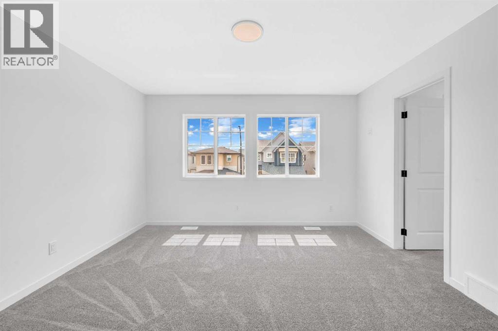 32 Rowmont Common Nw, Calgary, Alberta  T3L 0L3 - Photo 33 - A2233479