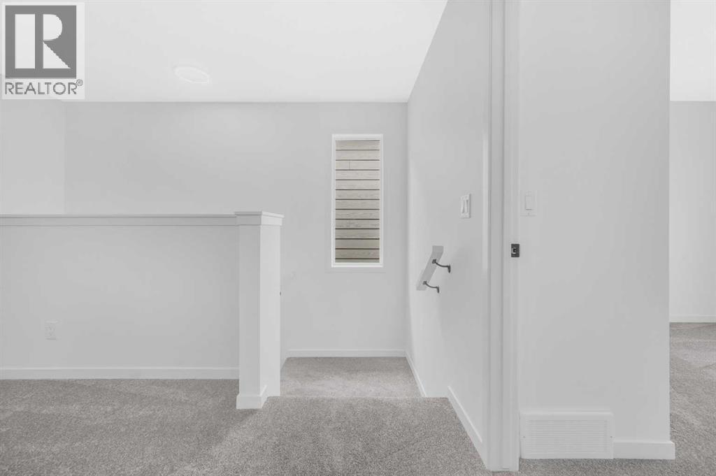 32 Rowmont Common Nw, Calgary, Alberta  T3L 0L3 - Photo 25 - A2233479