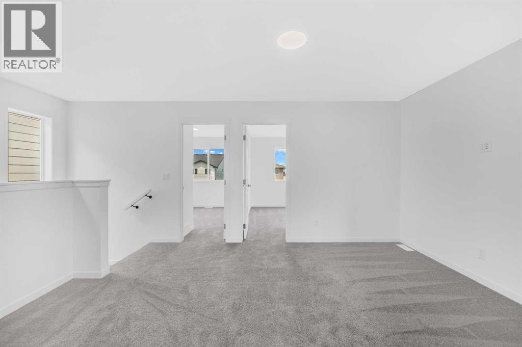 32 Rowmont Common Nw, Calgary, Alberta  T3L 0L3 - Photo 27 - A2233479