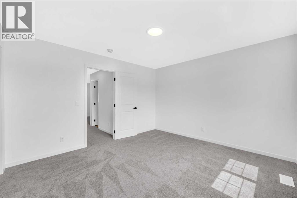 32 Rowmont Common Nw, Calgary, Alberta  T3L 0L3 - Photo 36 - A2233479