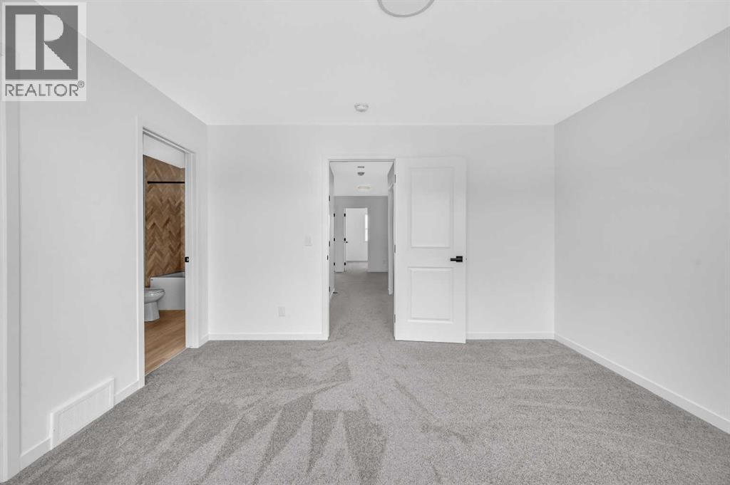 32 Rowmont Common Nw, Calgary, Alberta  T3L 0L3 - Photo 35 - A2233479