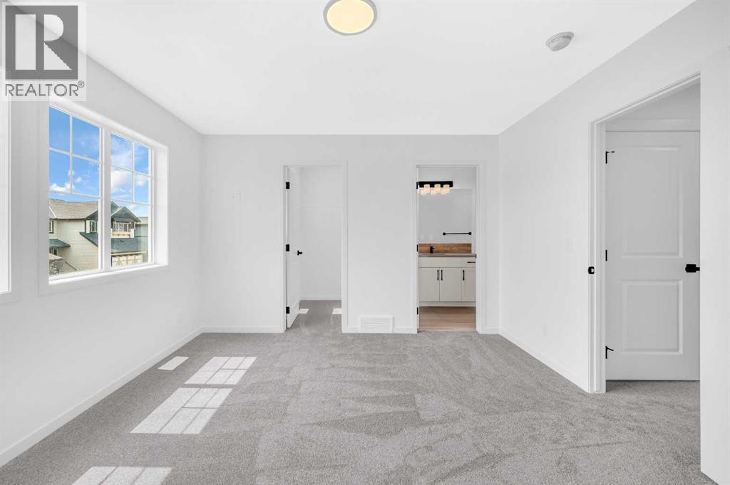 32 Rowmont Common Nw, Calgary, Alberta  T3L 0L3 - Photo 34 - A2233479