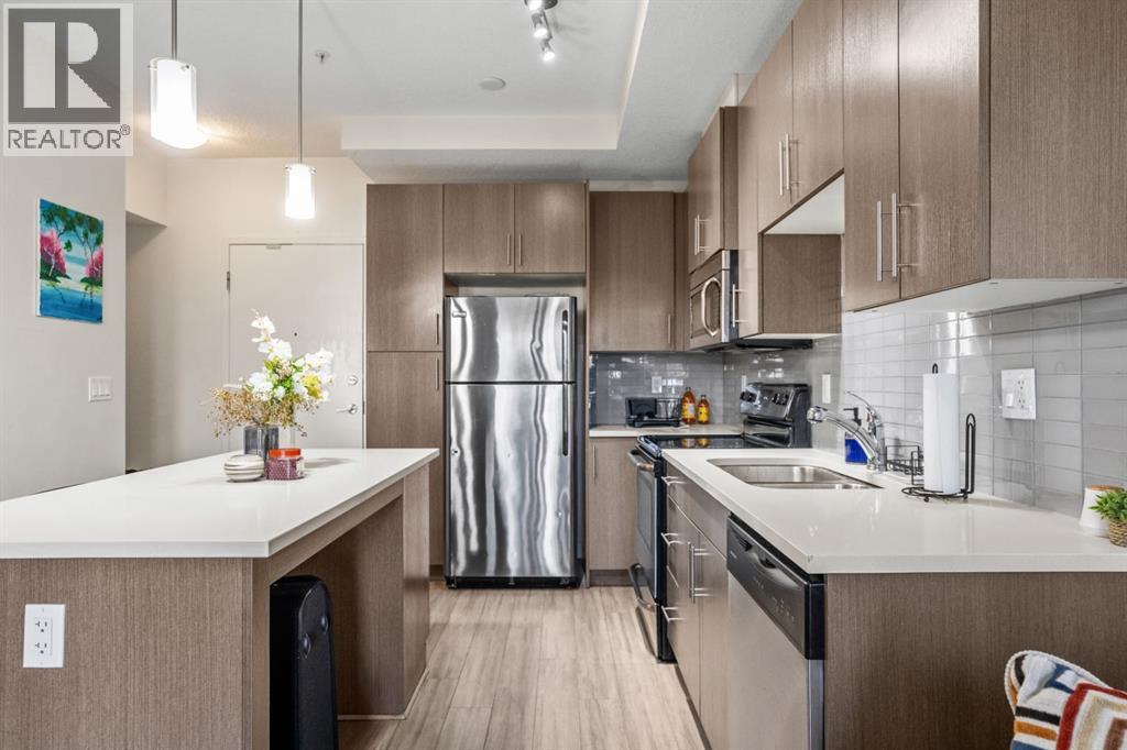 201, 15233 1 Street Se, Calgary, Alberta  T2X 0X1 - Photo 3 - A2270512