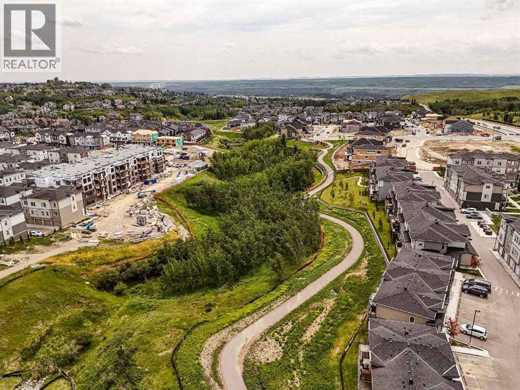 403, 205 Spring Creek Common Sw, Calgary, Alberta  T3H 6H4 - Photo 31 - A2260338