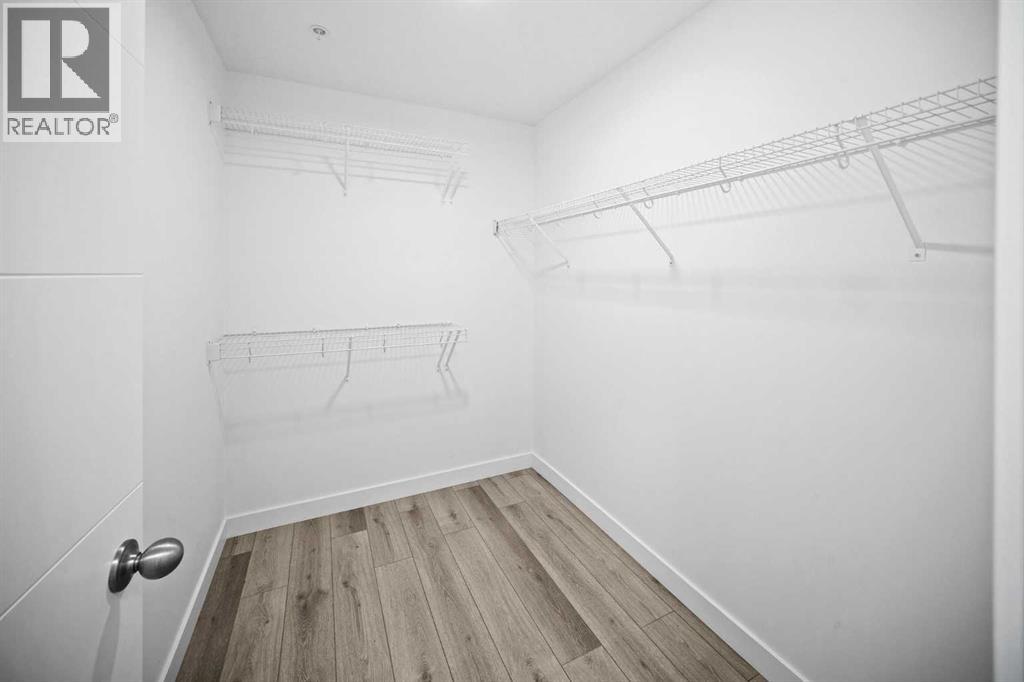 403, 205 Spring Creek Common Sw, Calgary, Alberta  T3H 6H4 - Photo 16 - A2260338