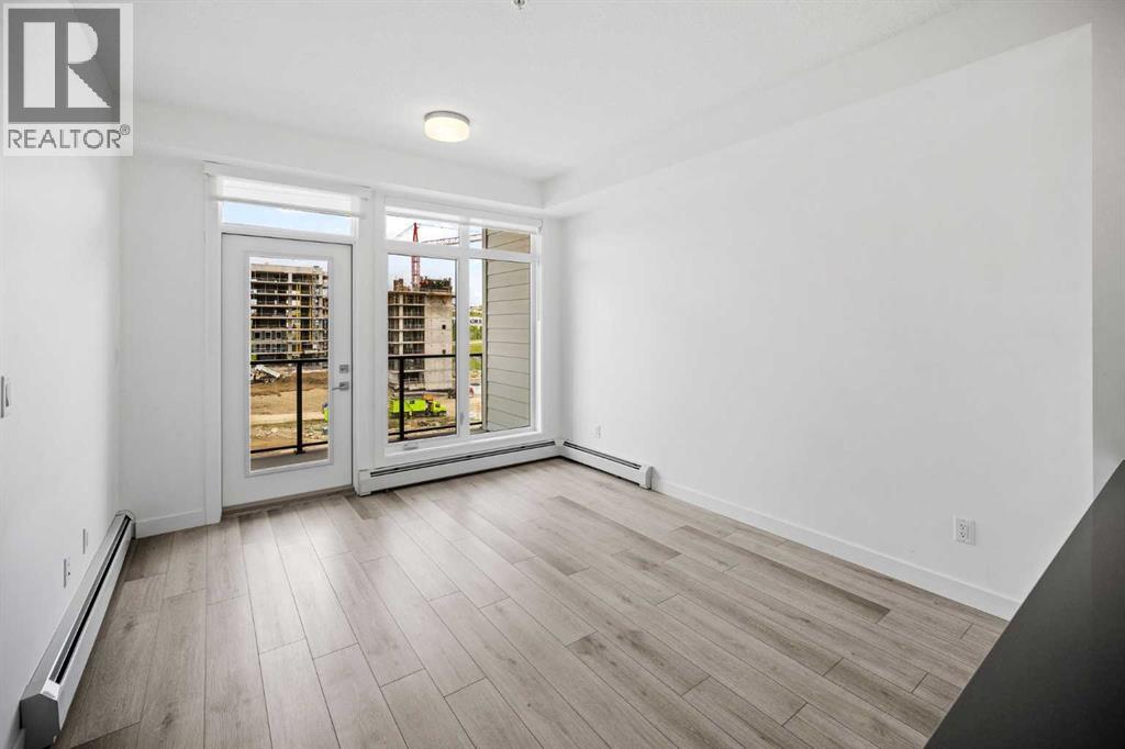 403, 205 Spring Creek Common Sw, Calgary, Alberta  T3H 6H4 - Photo 9 - A2260338