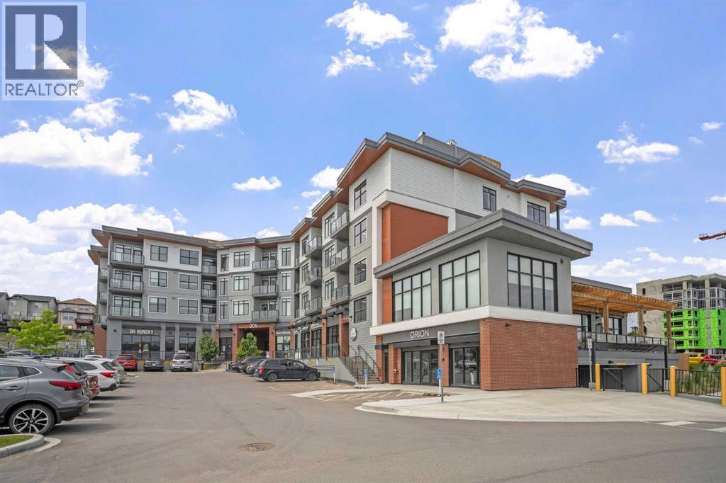 403, 205 Spring Creek Common Sw, Calgary, Alberta  T3H 6H4 - Photo 1 - A2260338