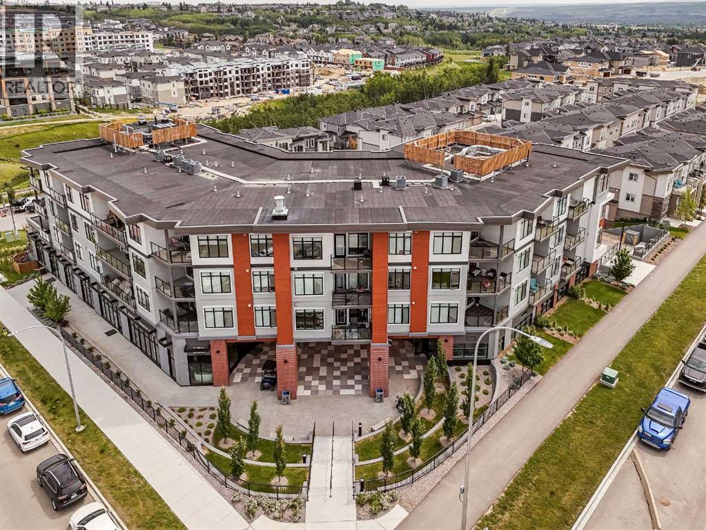 403, 205 Spring Creek Common Sw, Calgary, Alberta  T3H 6H4 - Photo 2 - A2260338