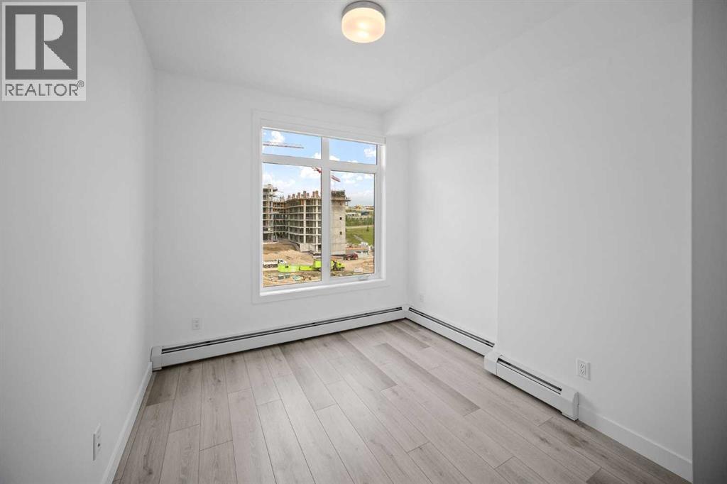 403, 205 Spring Creek Common Sw, Calgary, Alberta  T3H 6H4 - Photo 21 - A2260338