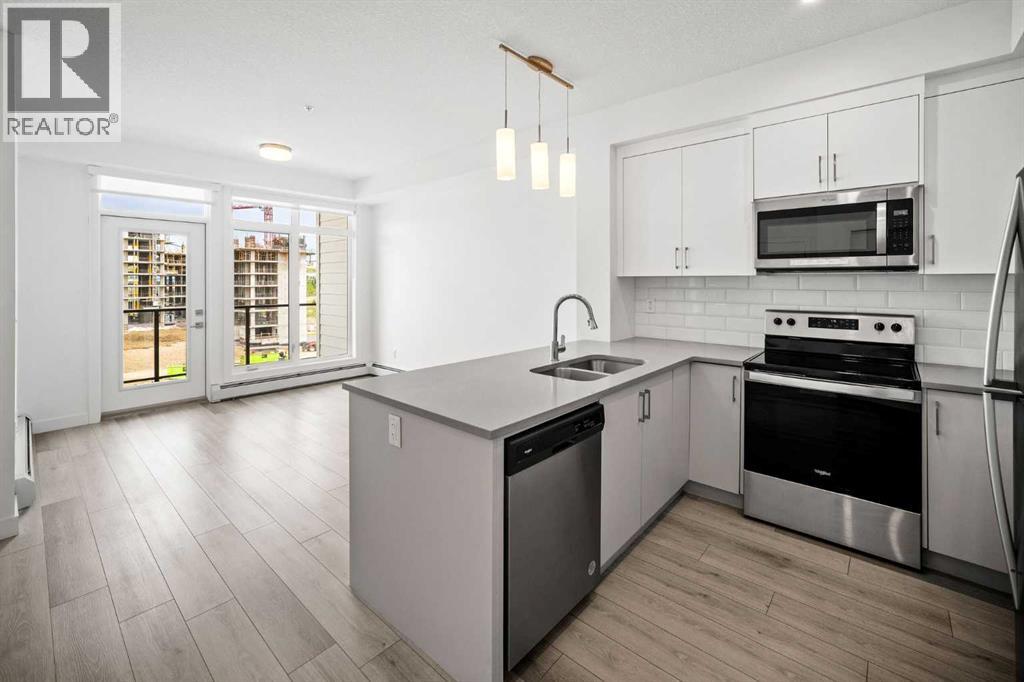 403, 205 Spring Creek Common Sw, Calgary, Alberta  T3H 6H4 - Photo 7 - A2260338