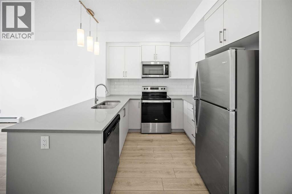 403, 205 Spring Creek Common Sw, Calgary, Alberta  T3H 6H4 - Photo 6 - A2260338