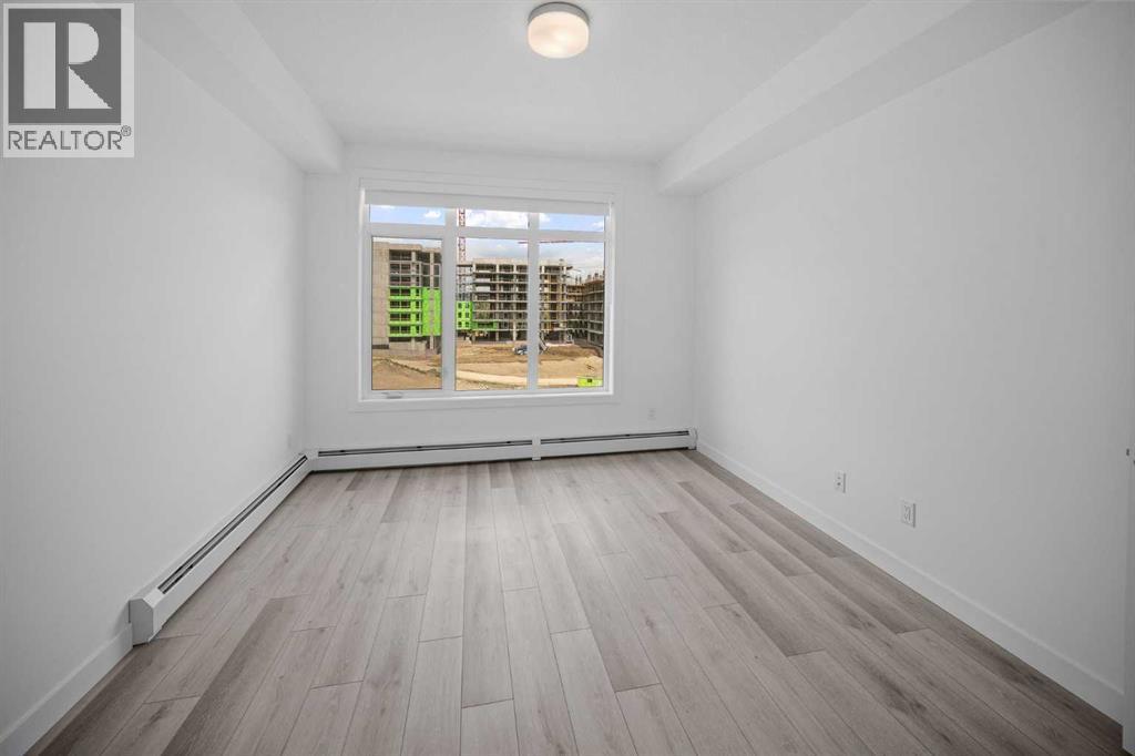 403, 205 Spring Creek Common Sw, Calgary, Alberta  T3H 6H4 - Photo 20 - A2260338