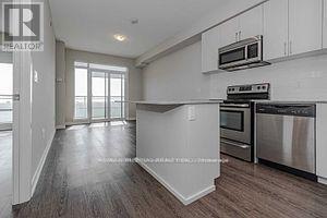 1311 - 2550 Eglinton Avenue W, Mississauga, Ontario  L5M 0Y2 - Photo 2 - W12568056