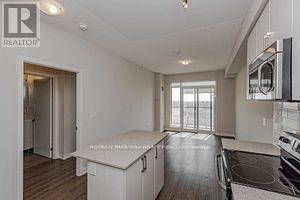 1311 - 2550 Eglinton Avenue W, Mississauga, Ontario  L5M 0Y2 - Photo 4 - W12568056